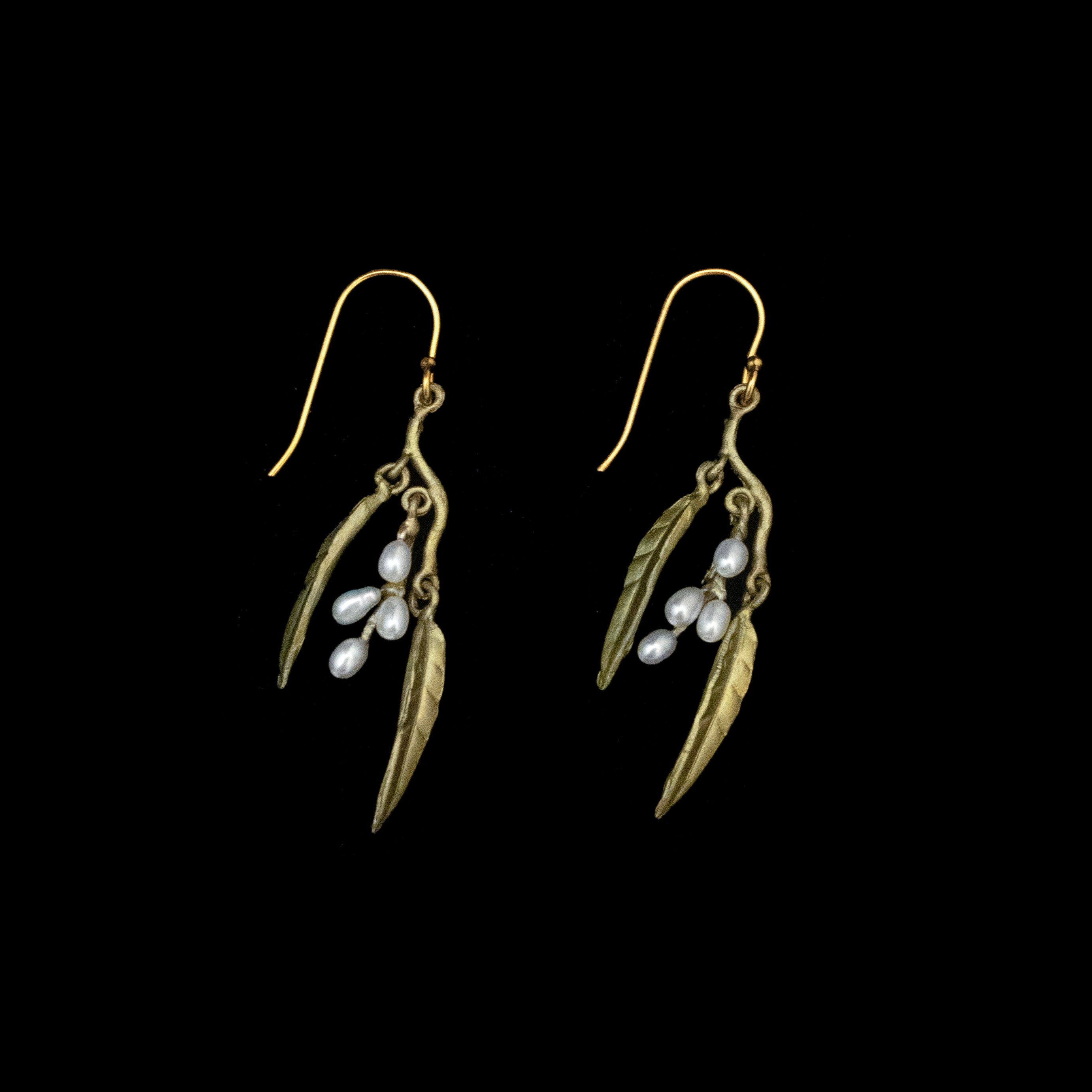 The Weeping Willow Earrings - Wire feature gold hooks with willow branch designs, each adorned with two leaves and three small white pearls that resemble catkins, capturing the elegance of freshwater seed pearl earrings.